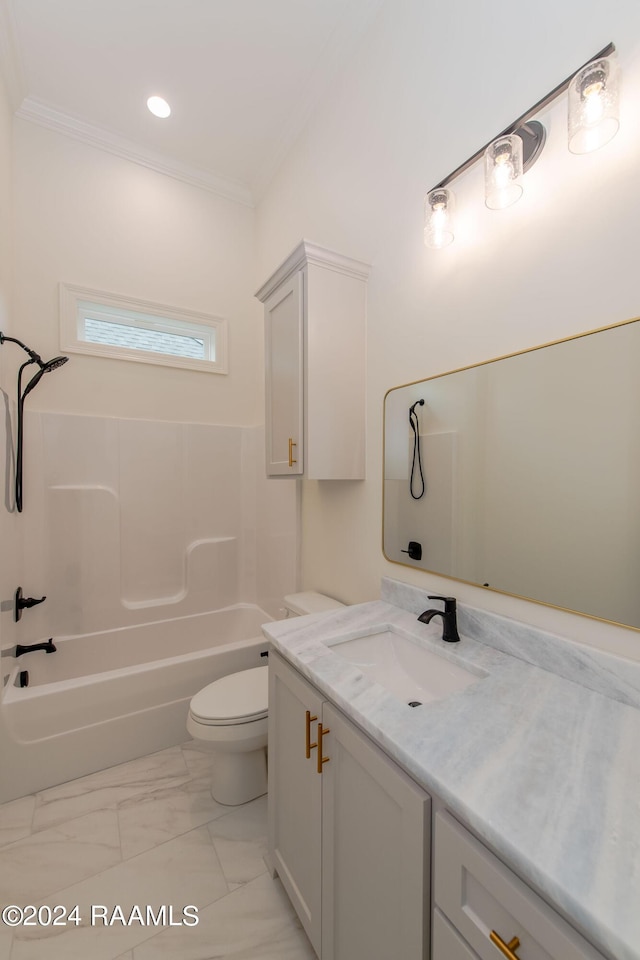 full bathroom featuring toilet, vanity, ornamental molding, and  shower combination