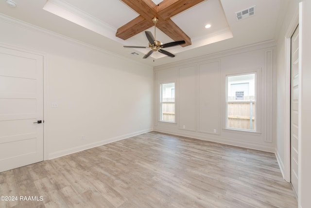 spare room with light hardwood / wood-style flooring, beam ceiling, crown molding, ceiling fan, and coffered ceiling