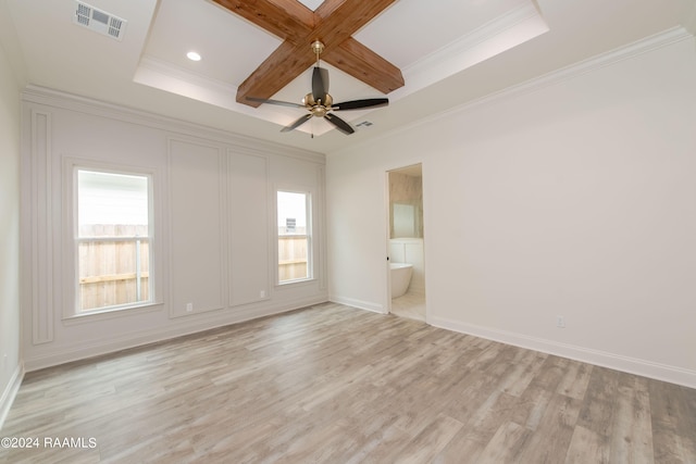 empty room with beamed ceiling, crown molding, coffered ceiling, and light hardwood / wood-style flooring