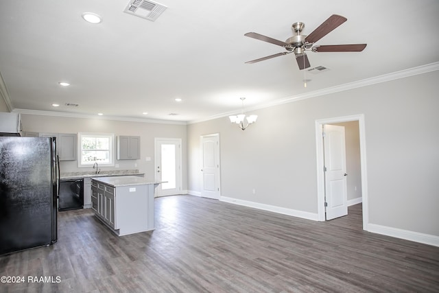 kitchen featuring black appliances, a center island, hanging light fixtures, dark hardwood / wood-style floors, and gray cabinetry