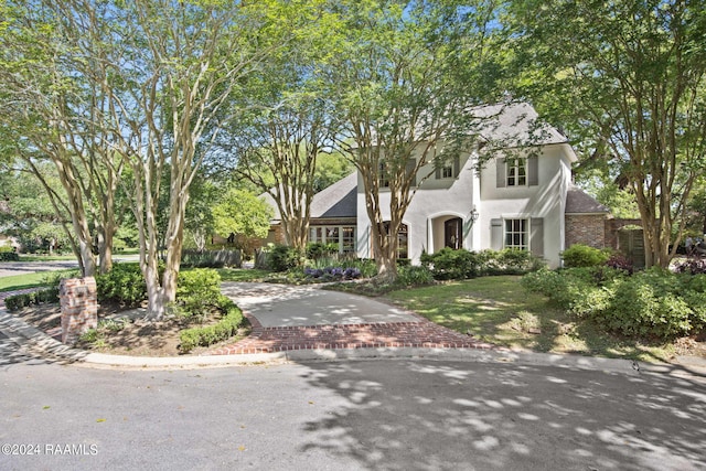 view of front of home featuring stucco siding