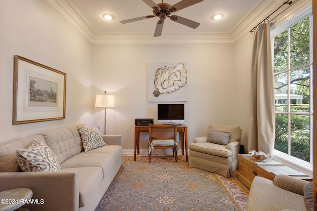 living room featuring ceiling fan and crown molding