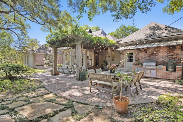 view of patio / terrace featuring exterior kitchen and grilling area