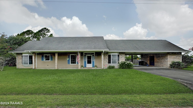 ranch-style home with a carport and a front lawn