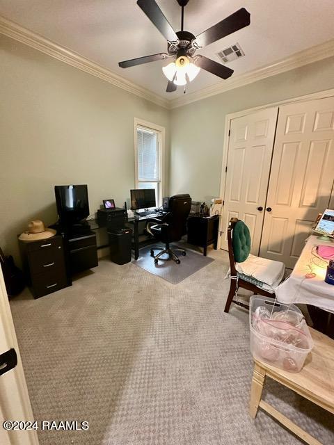 office with ceiling fan, light colored carpet, and ornamental molding