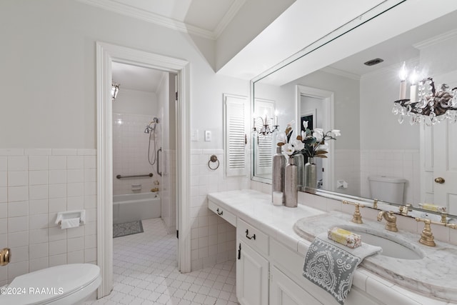 full bathroom featuring tile walls, vanity with extensive cabinet space, and toilet