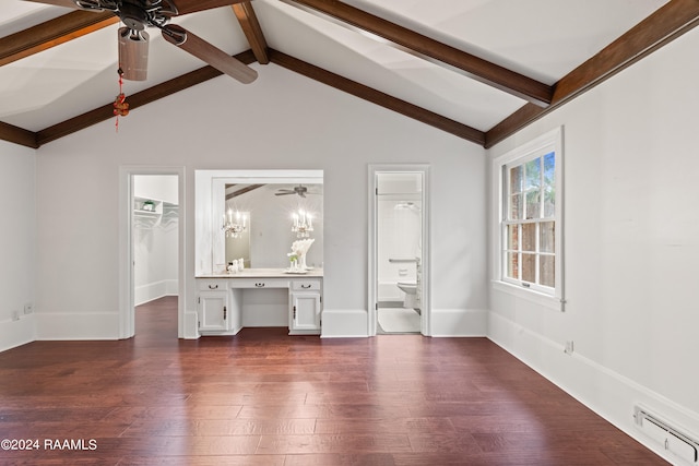 interior space with ceiling fan with notable chandelier, lofted ceiling with beams, and dark wood-type flooring