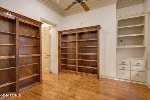 walk in closet featuring ceiling fan and light hardwood / wood-style floors