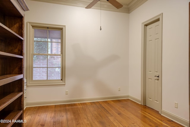 unfurnished room with ceiling fan, crown molding, and light hardwood / wood-style flooring