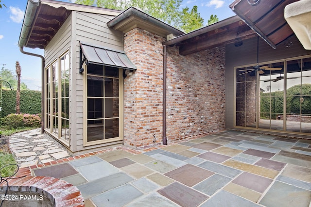 view of patio with ceiling fan and french doors