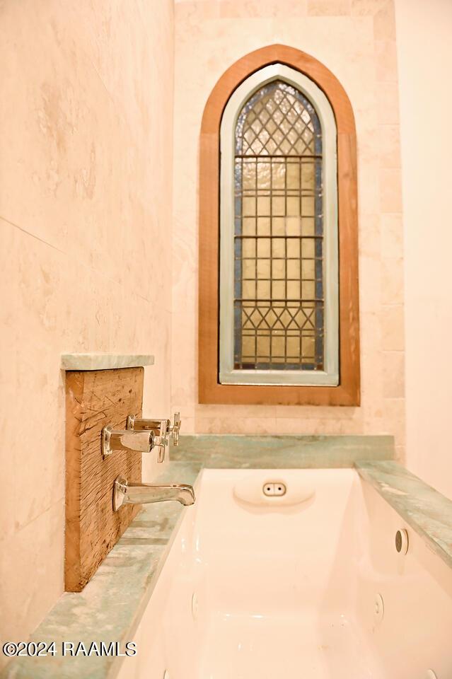 bathroom featuring a bathtub