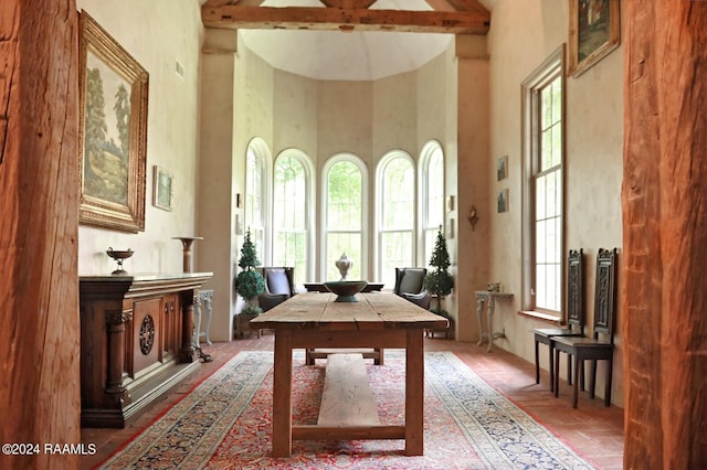 interior space featuring a towering ceiling