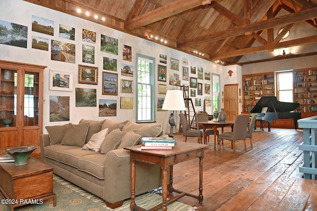 living room with high vaulted ceiling, beam ceiling, wood ceiling, and hardwood / wood-style floors