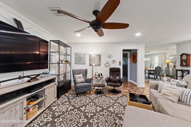 living room with ceiling fan