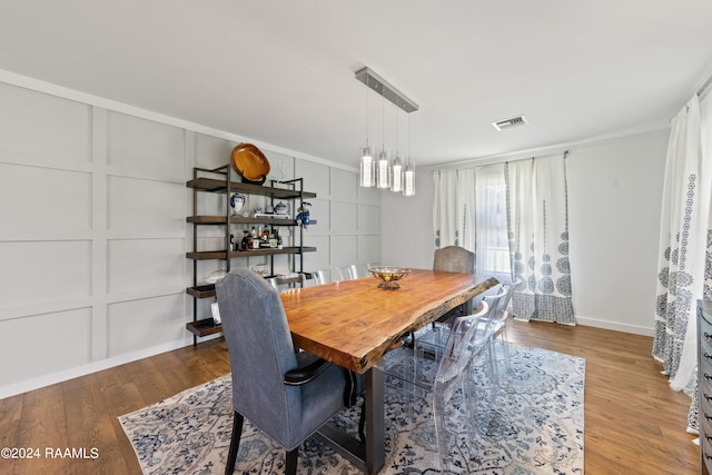 dining area featuring hardwood / wood-style floors