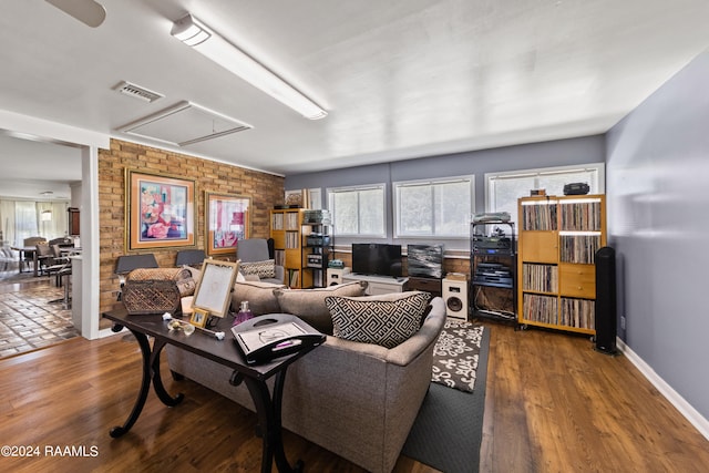 living room featuring dark wood-type flooring