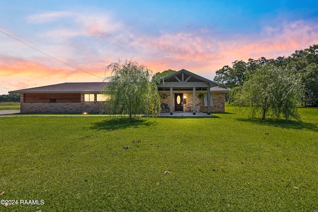 craftsman-style house featuring a yard