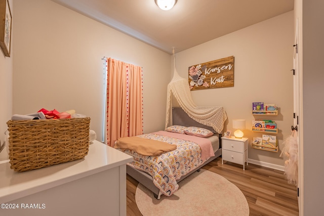 bedroom featuring hardwood / wood-style flooring