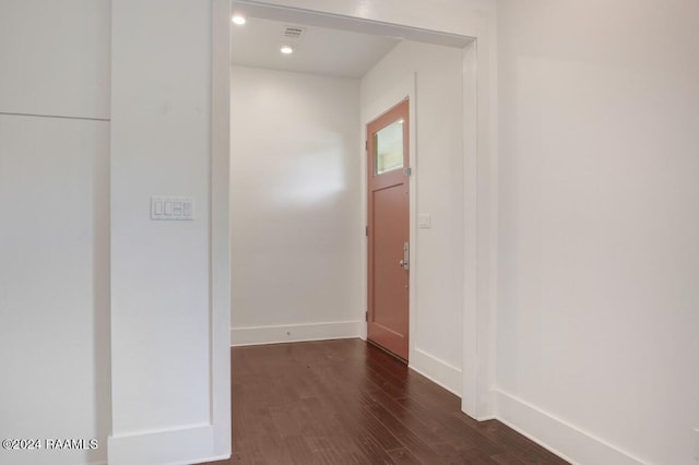 foyer entrance with dark hardwood / wood-style flooring