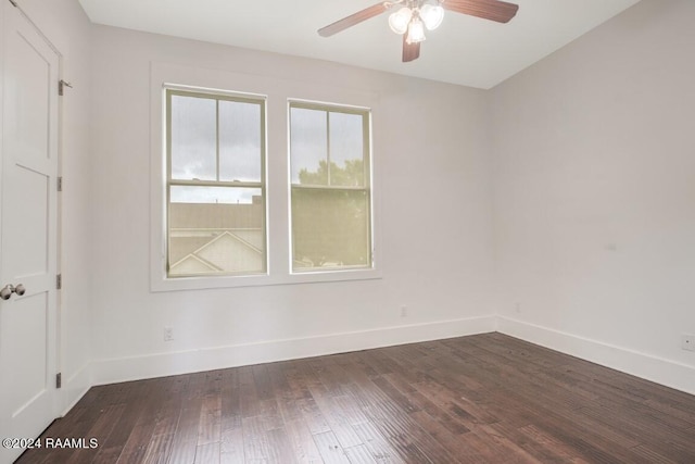 empty room featuring hardwood / wood-style floors and ceiling fan