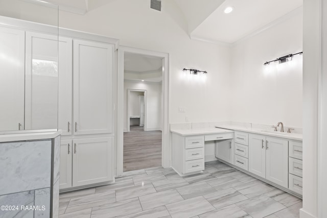 bathroom featuring vanity and hardwood / wood-style flooring