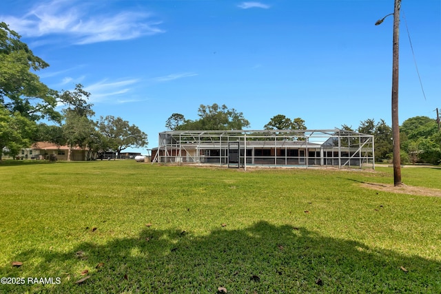 617 Cemetery Rd, Saint Martinville, LA 70582 - view of grassy yard with glass enclosure