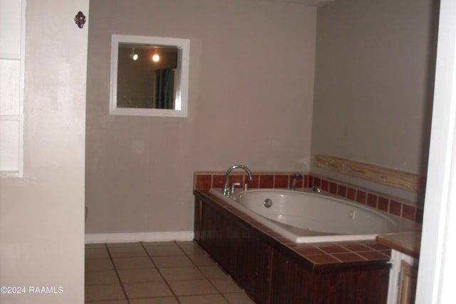 bathroom with tiled bath and tile floors