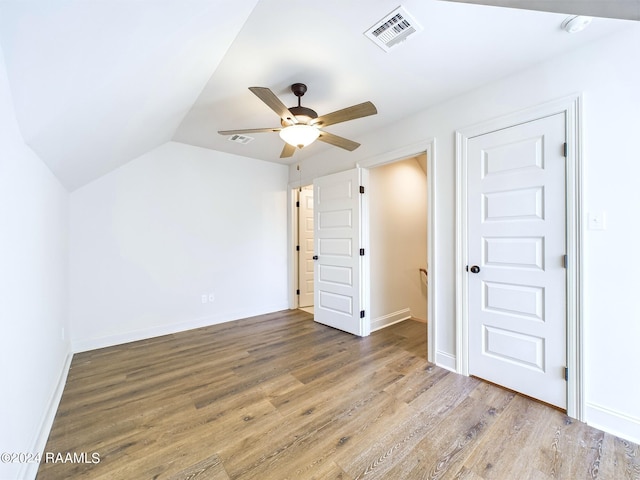 bonus room with wood-type flooring, ceiling fan, and lofted ceiling