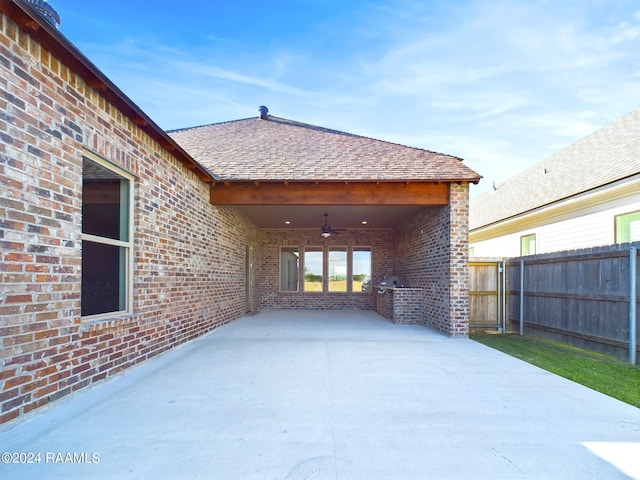 view of patio with ceiling fan