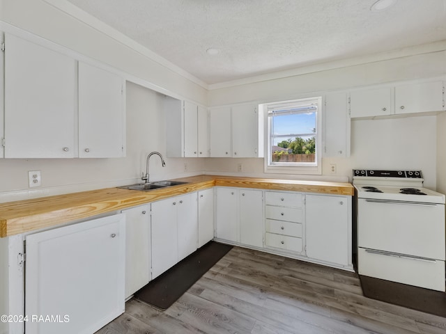 kitchen with white range with electric stovetop, hardwood / wood-style floors, white cabinetry, wooden counters, and sink