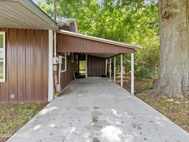 exterior space featuring a carport