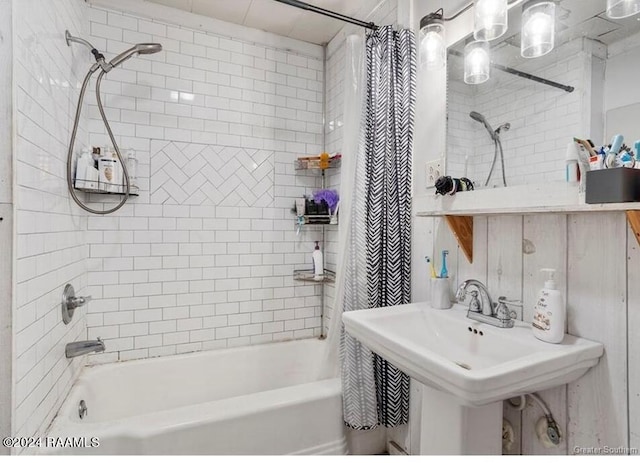 bathroom with shower / tub combo with curtain