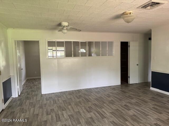 123 Lester St, Ville Platte, LA 70586 - unfurnished room with ceiling fan and dark hardwood / wood-style flooring