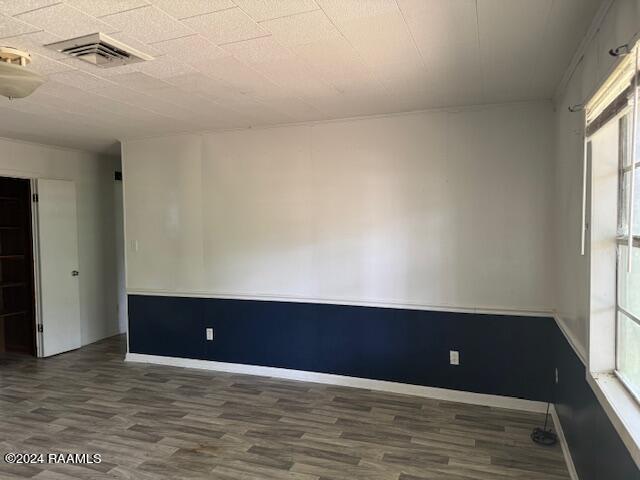 123 Lester St, Ville Platte, LA 70586 - spare room featuring dark hardwood / wood-style floors