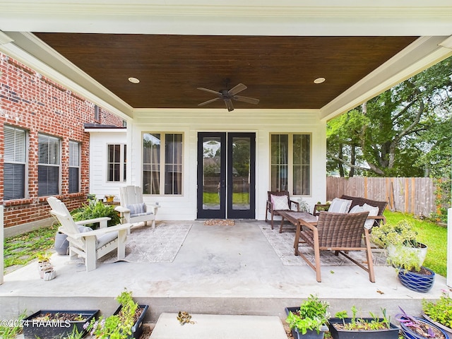 view of patio featuring ceiling fan