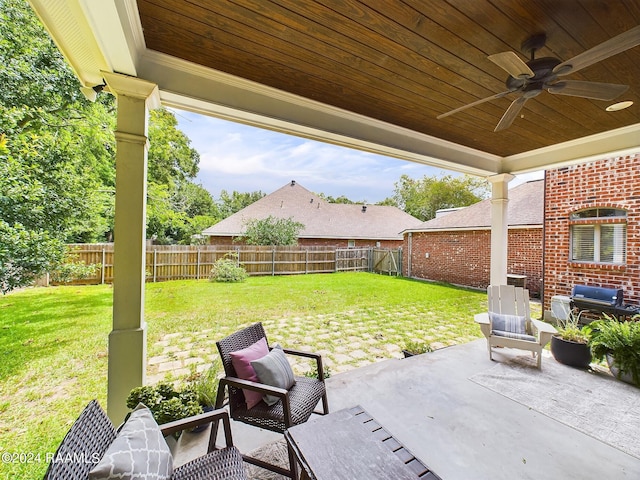 view of patio featuring ceiling fan