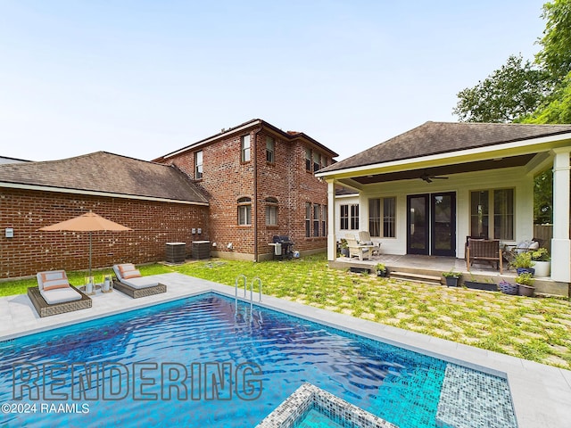 view of pool featuring area for grilling, ceiling fan, a yard, and central AC