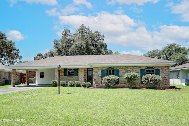 single story home featuring a carport and a front lawn