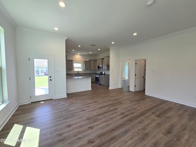 unfurnished living room featuring ornamental molding and dark hardwood / wood-style flooring