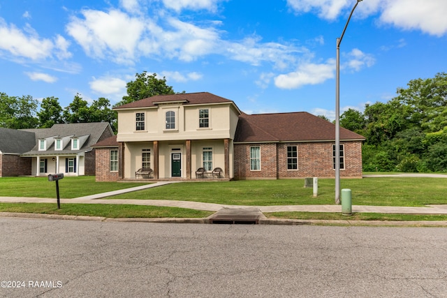 view of front of house with a front yard