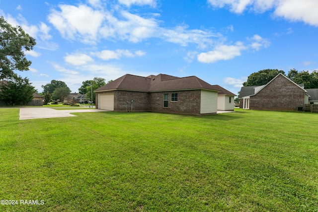 view of yard featuring a garage