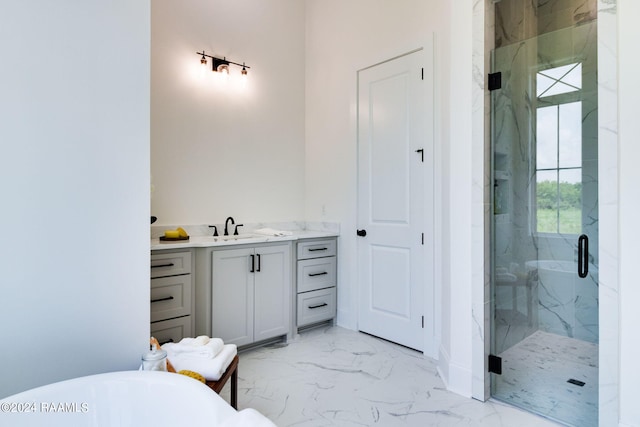 bathroom featuring tile floors, separate shower and tub, and vanity