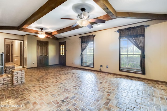 interior space featuring beamed ceiling and ceiling fan