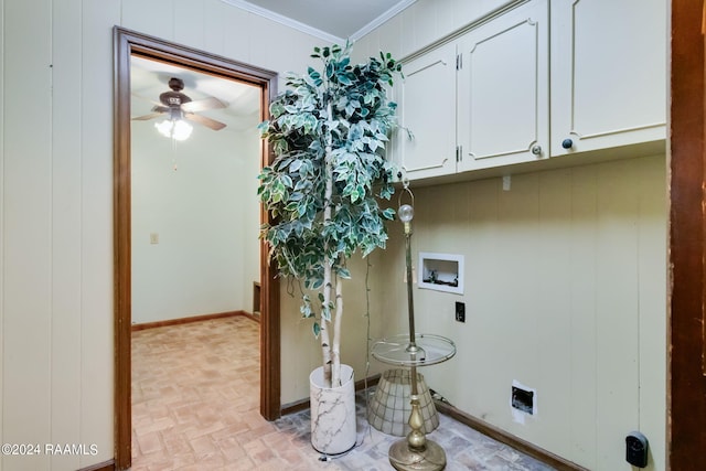 laundry area with cabinets, ornamental molding, ceiling fan, and washer hookup