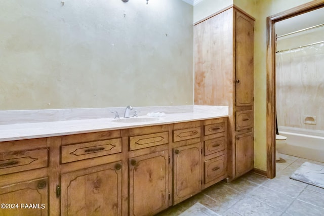 full bathroom with tile flooring, vanity, toilet, and shower / bath combo with shower curtain