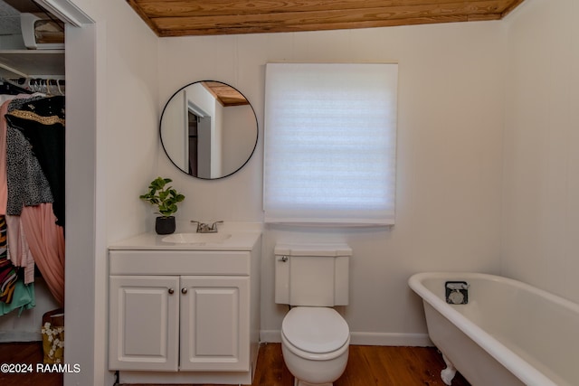 bathroom featuring a tub to relax in, wood-type flooring, toilet, vanity, and wood ceiling