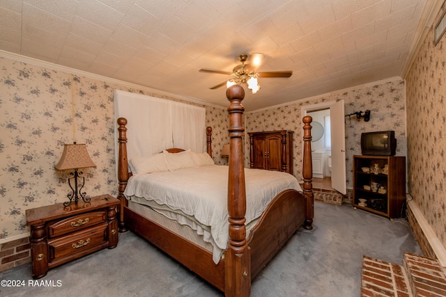 bedroom with carpet, ceiling fan, and crown molding