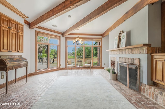 living room featuring crown molding, beamed ceiling, a fireplace, and a chandelier