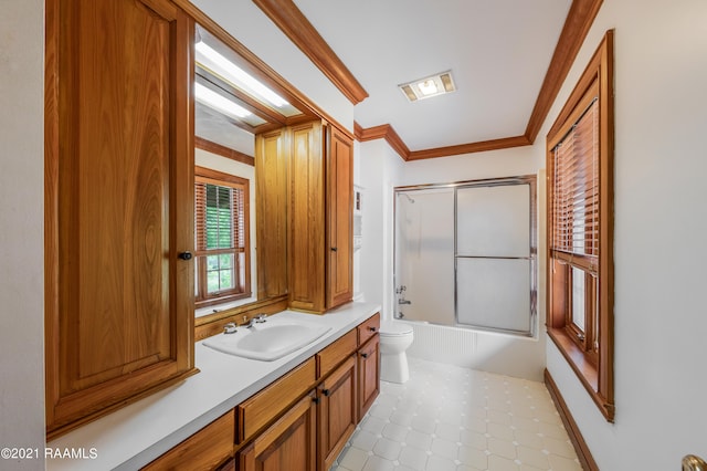 full bathroom with enclosed tub / shower combo, oversized vanity, toilet, crown molding, and tile flooring