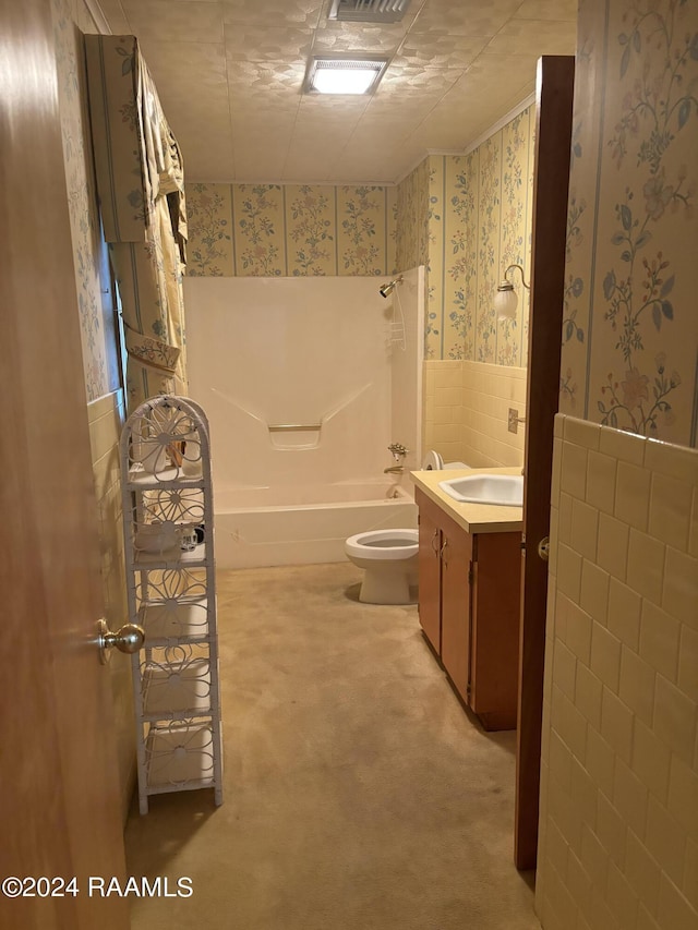 full bathroom featuring shower / bath combination, vanity, tile walls, and toilet